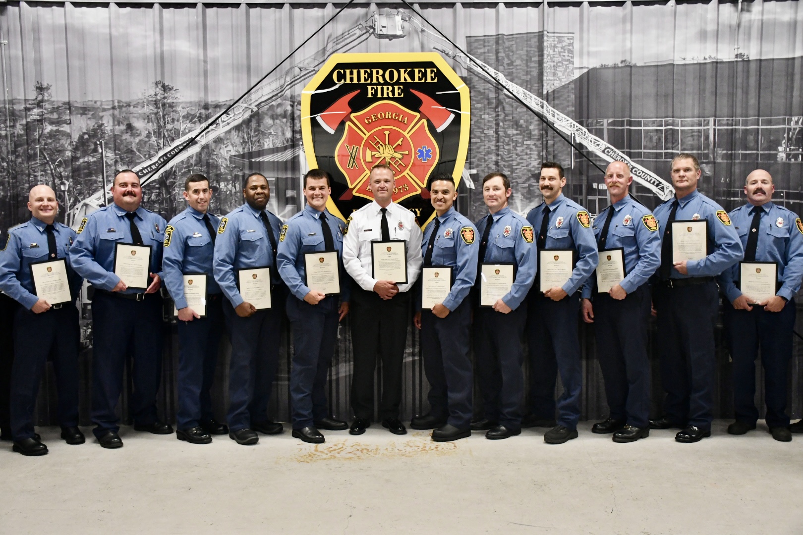 Twelve Members Promoted