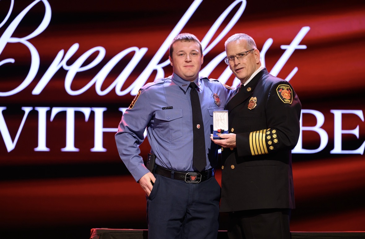 FAO Joel Sauders receives his award. 