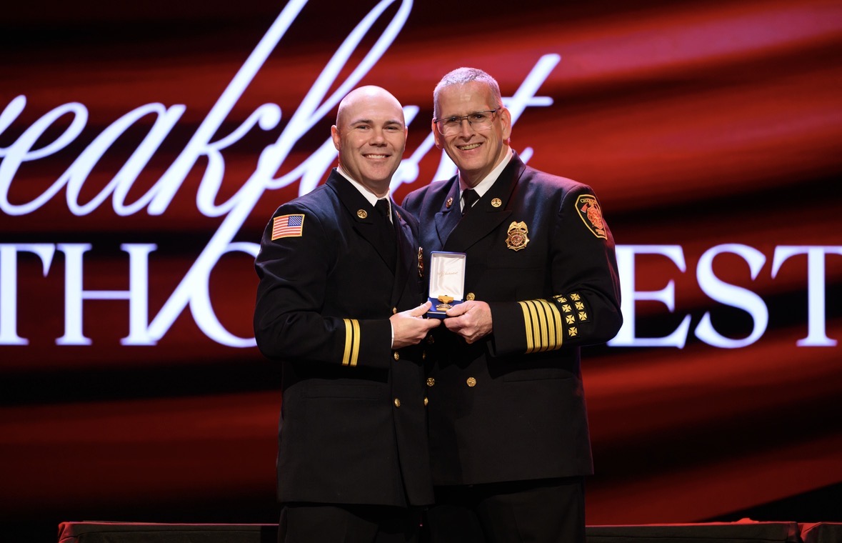 Chief Jason Williams receives his award.